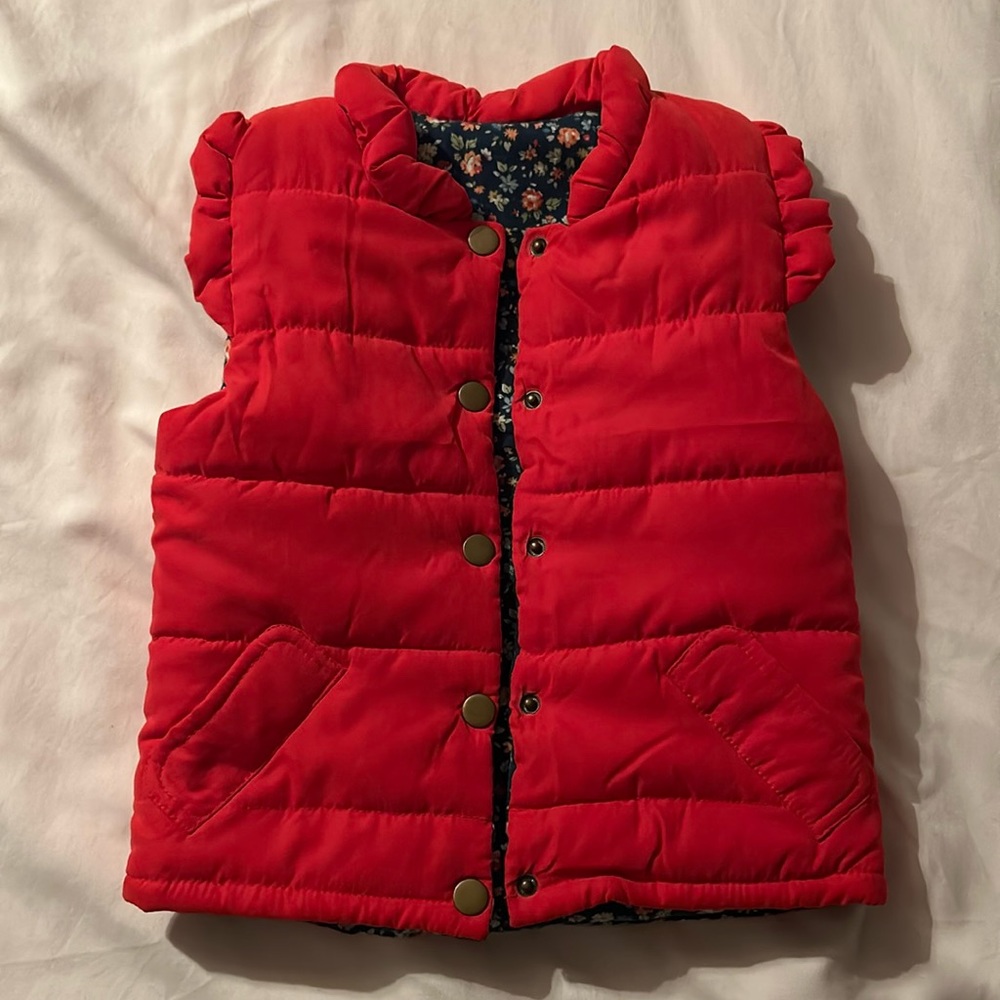 Reversible puffer vest perfect for Spring or Fall.